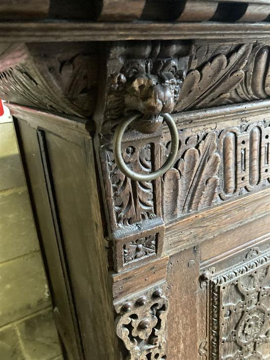 A 19th century Flemish carved oak four drawer cabinet, width 124cm, depth 70cm, height 150cm